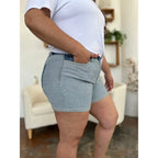 Two-tone Judy Blue denim shorts with color block detail and curve-hugging stretch. Plus size friendly perfect for bold