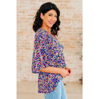 Unleash your inner dreamer with our Dreamer Peplum Top in Painted Royal! Featuring a playful v - neckline flowy dolman