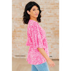 Step out in our Dreamer Peplum Top Pink Leopard! Featuring a playful v - neckline flowy dolman sleeves and flattering