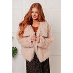 Our Dreaming in Blush Faux Fur Coat will make you shine on the dance floor or out town! Its shaggy faux lambs fur