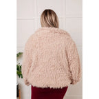 Our Dreaming in Blush Faux Fur Coat will make you shine on the dance floor or out town! Its shaggy faux lambs fur