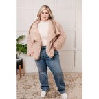 Our Dreaming in Blush Faux Fur Coat will make you shine on the dance floor or out town! Its shaggy faux lambs fur