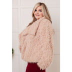 Our Dreaming in Blush Faux Fur Coat will make you shine on the dance floor or out town! Its shaggy faux lambs fur