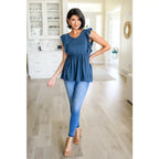 Our Dusty Blue Ruffled Babydoll Top is the perfect addition to your wardrobe! Crafted from a soft and stretchy jersey