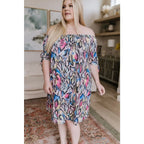 Bold off-shoulder animal print shift dress knee-length and curve-friendly. Available in S to 3XL. Ships 2–3 days.