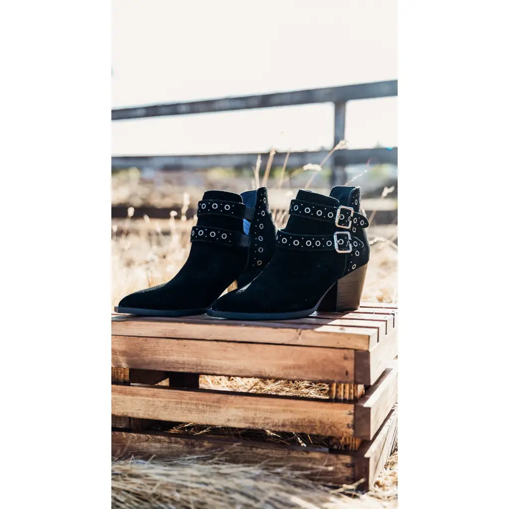 Step into timeless style with the Elsa Leather Ankle Boot in Black! Genuine suede stylish hardware and cushioned