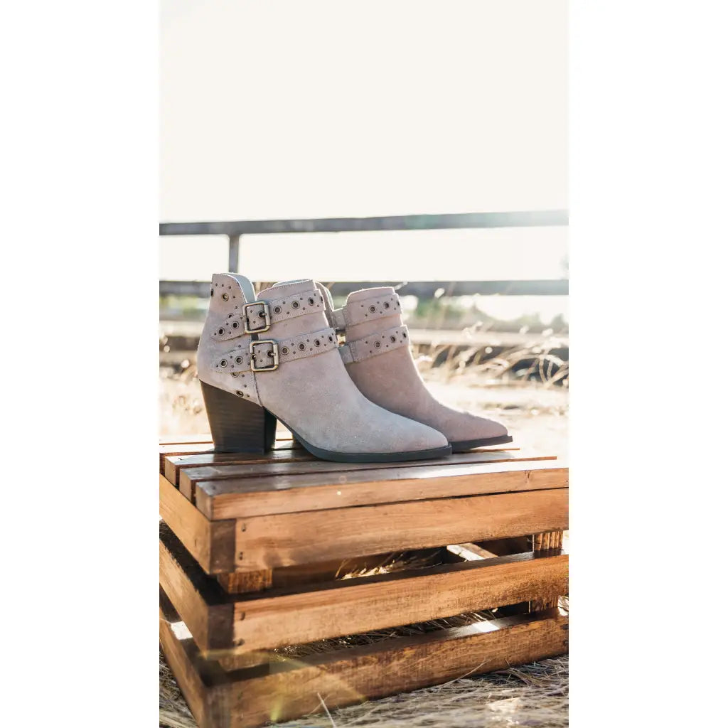 Timeless and versatile the Elsa Leather Ankle Boot in Taupe features a chic genuine suede with stylish hardware
