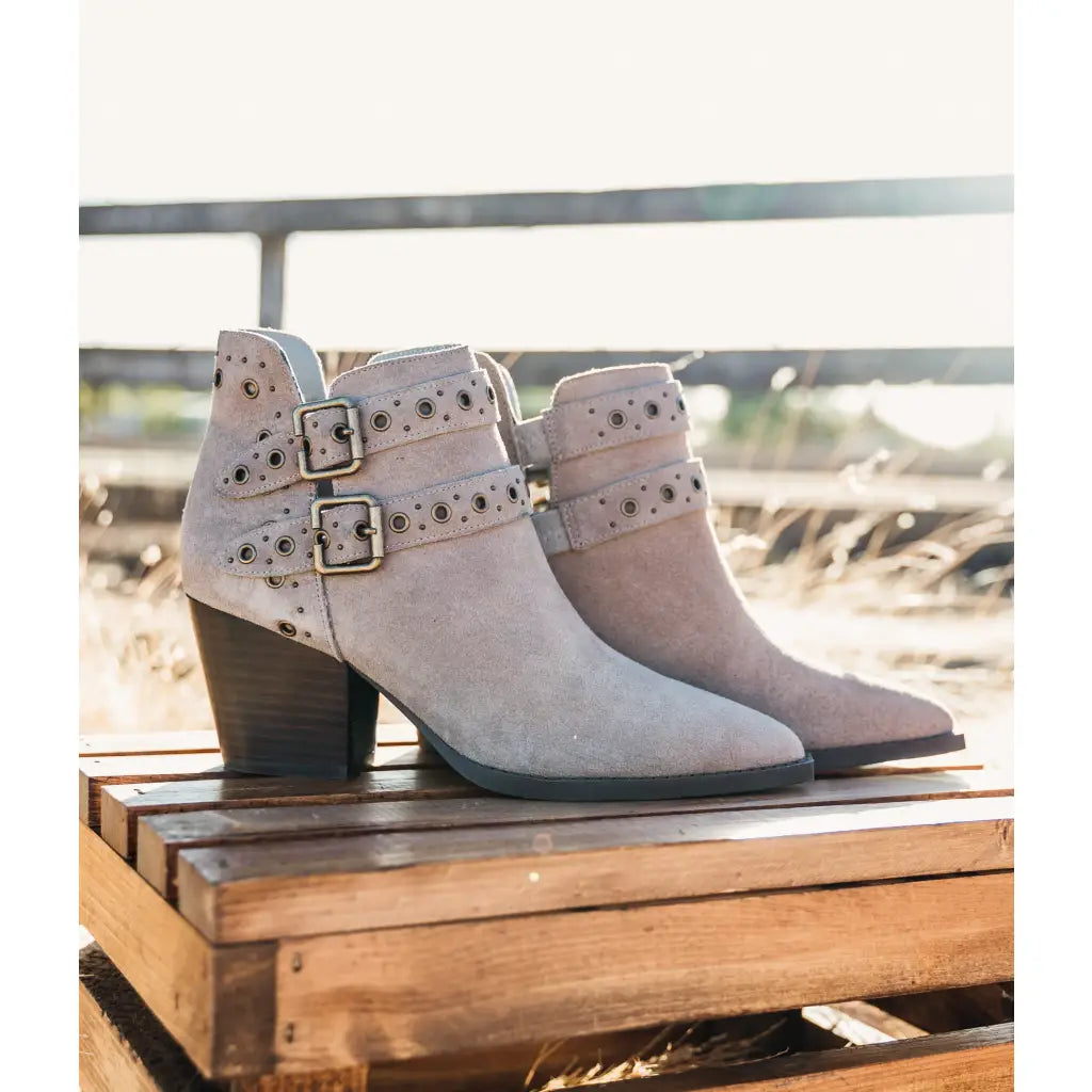 Timeless and versatile the Elsa Leather Ankle Boot in Taupe features a chic genuine suede with stylish hardware