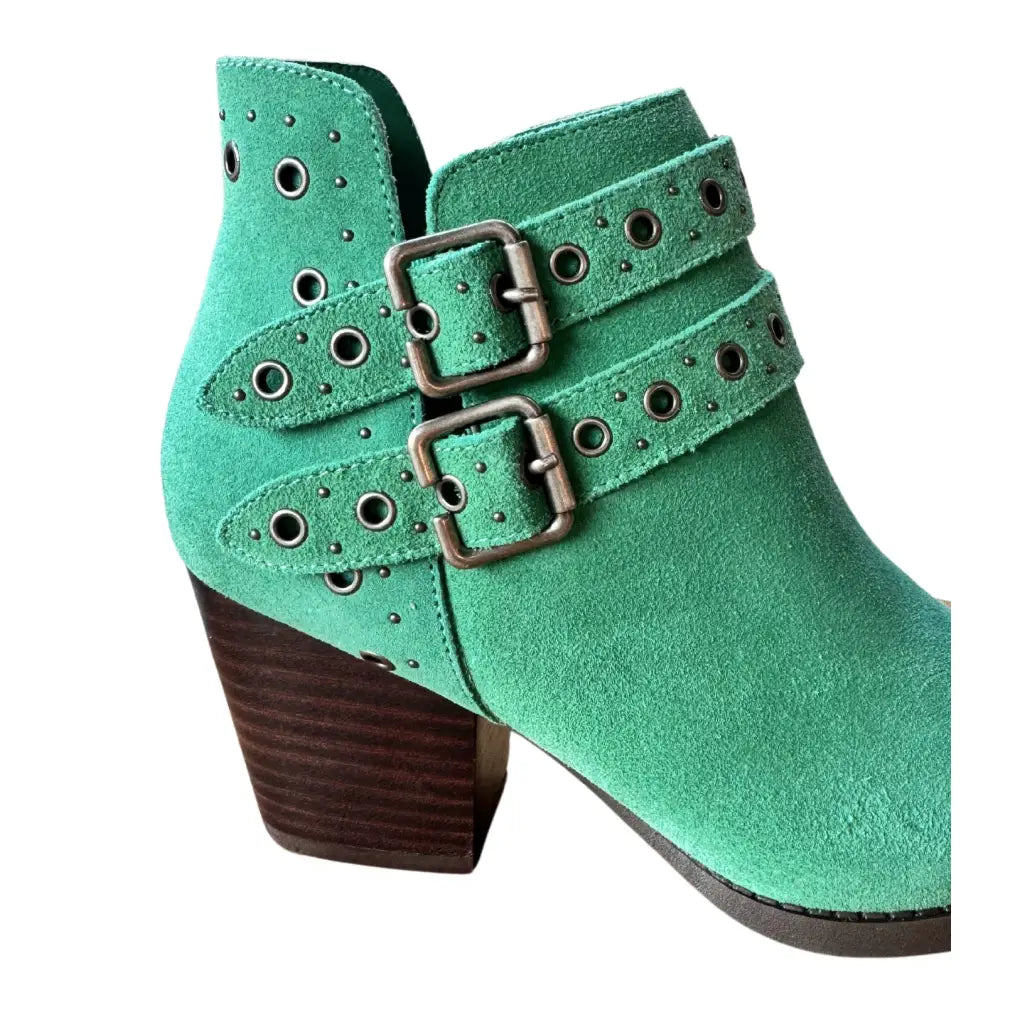 Make a statement with the Elsa Leather Ankle Boot in Teal! Genuine suede stylish hardware and cushioned comfort.