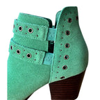 Make a statement with the Elsa Leather Ankle Boot in Teal! Genuine suede stylish hardware and cushioned comfort.