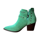 Make a statement with the Elsa Leather Ankle Boot in Teal! Genuine suede stylish hardware and cushioned comfort.