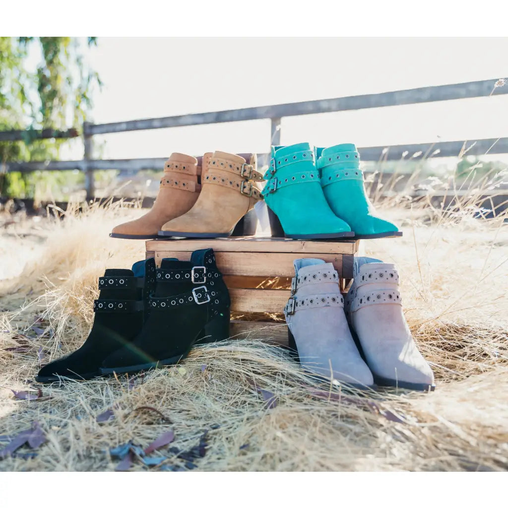 Make a statement with the Elsa Leather Ankle Boot in Teal! Genuine suede stylish hardware and cushioned comfort.