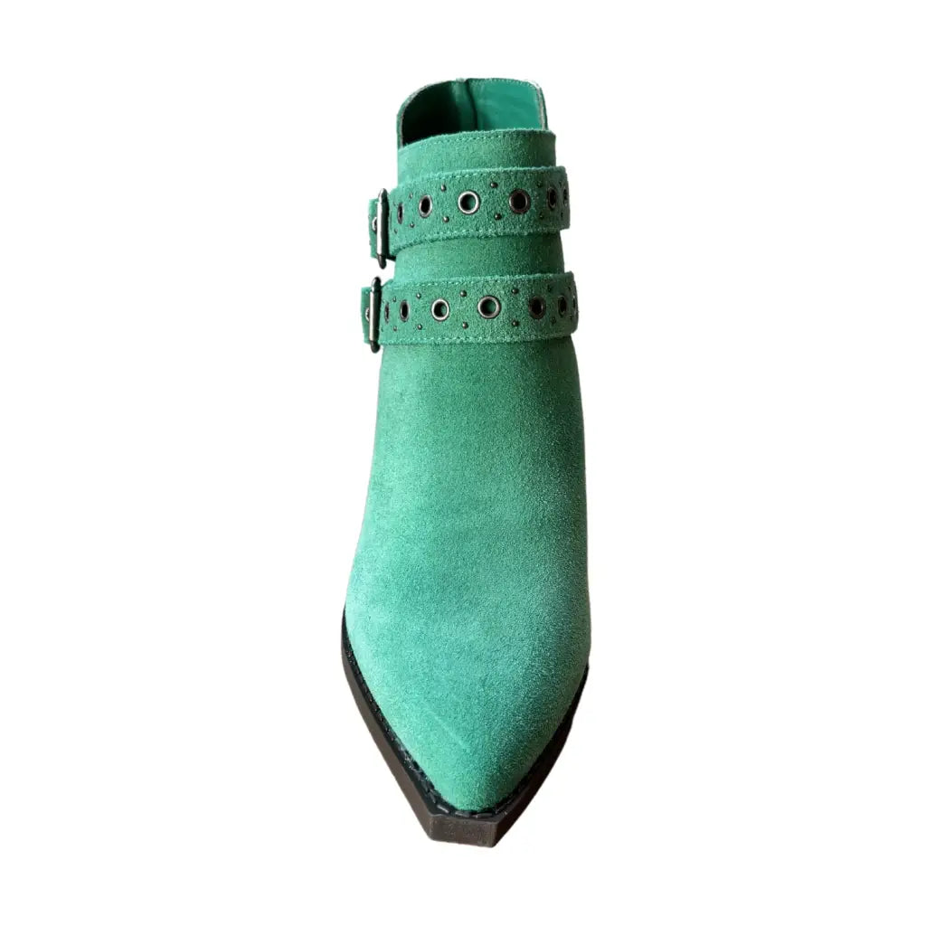 Make a statement with the Elsa Leather Ankle Boot in Teal! Genuine suede stylish hardware and cushioned comfort.