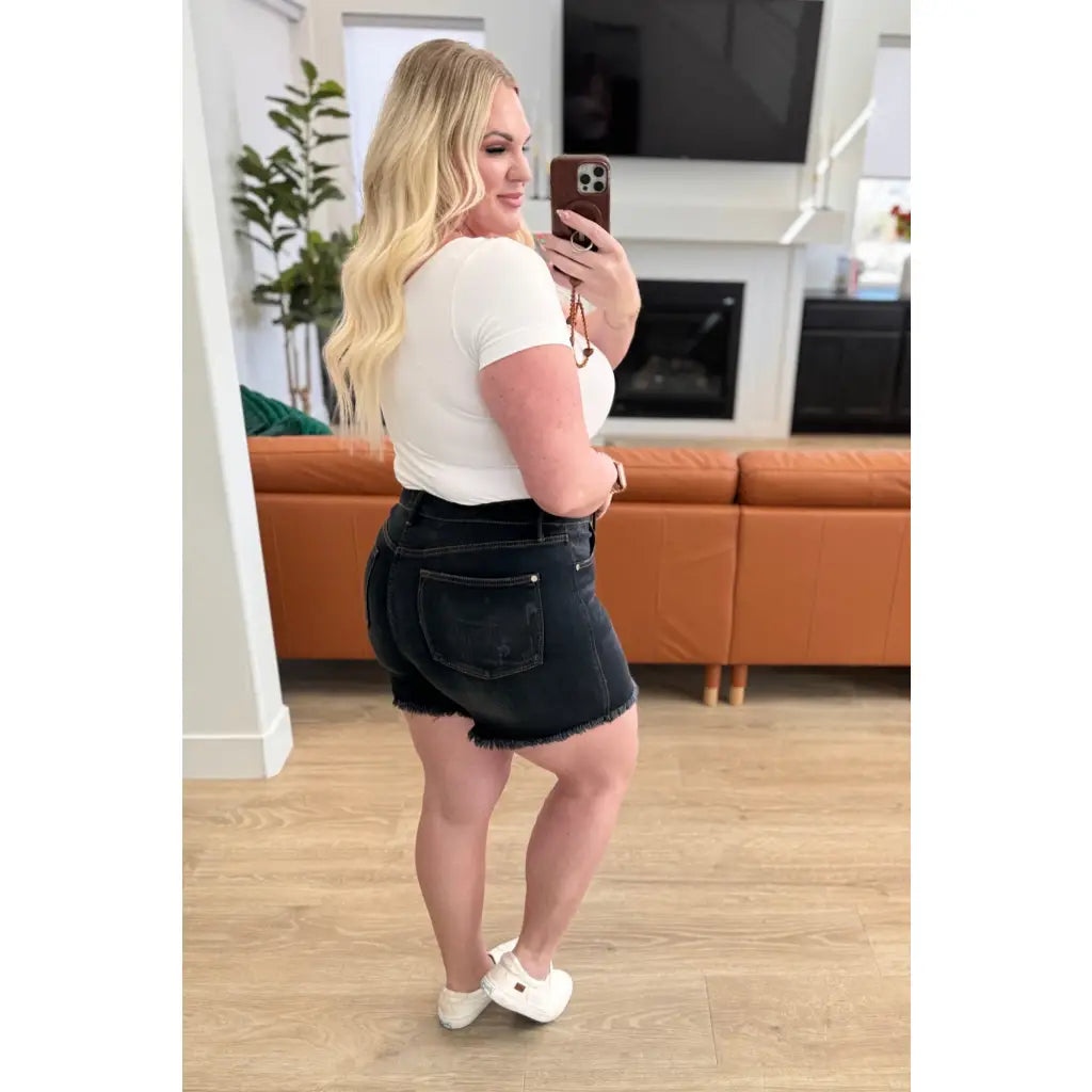 Get ready for some frayed fun with our Ember High Rise Control Top Fray Hem Shorts from Judy Blue! The washed