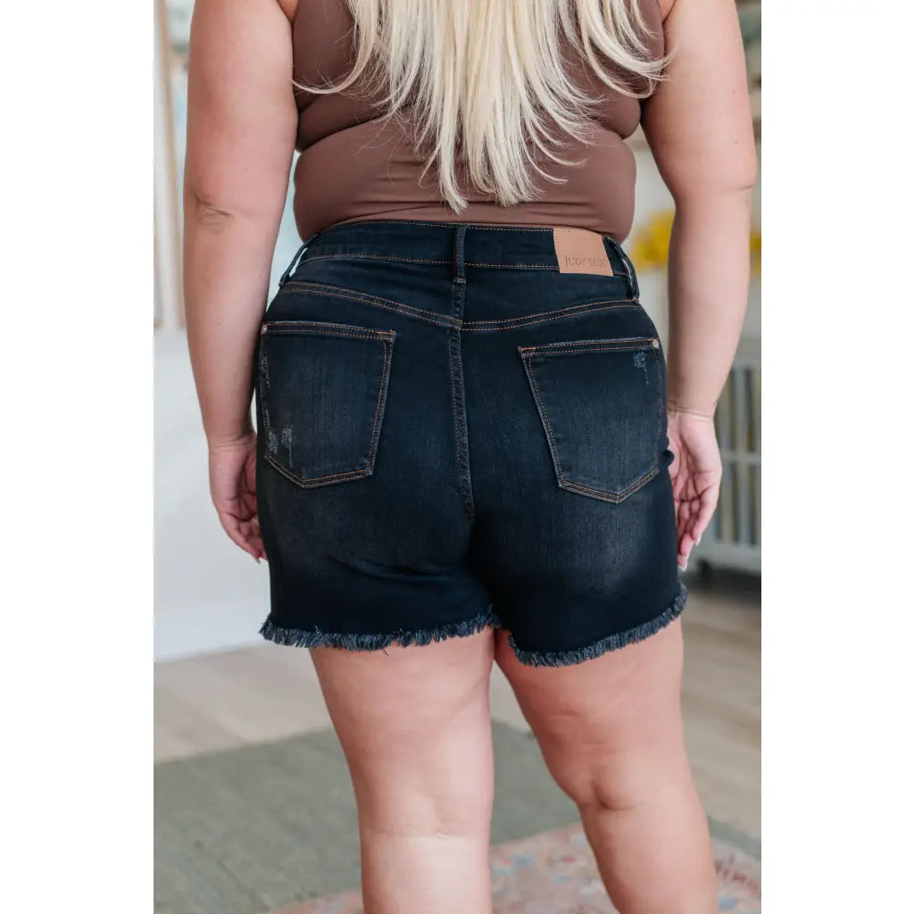 Get ready for some frayed fun with our Ember High Rise Control Top Fray Hem Shorts from Judy Blue! The washed