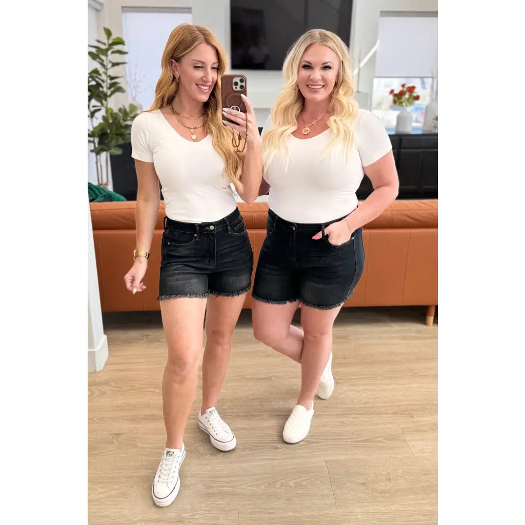 Get ready for some frayed fun with our Ember High Rise Control Top Fray Hem Shorts from Judy Blue! The washed
