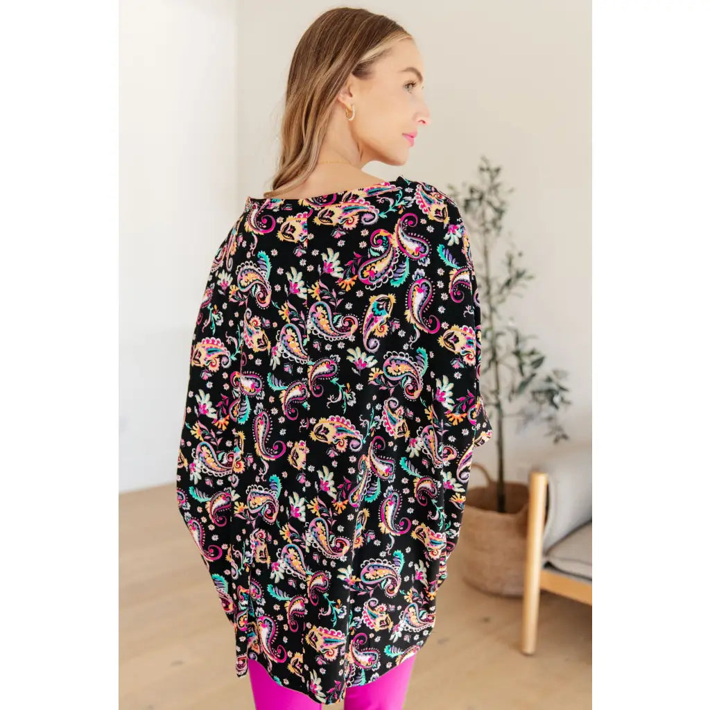 The Essential Blouse in Black and Pink Paisley is the perfect blend of style comfort. boat neck bat wing sleeve add