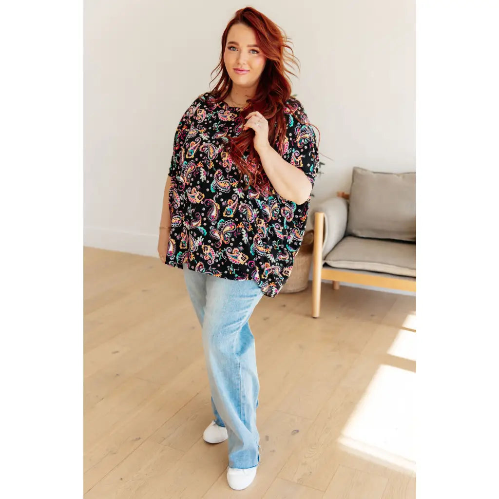 The Essential Blouse in Black and Pink Paisley is the perfect blend of style comfort. boat neck bat wing sleeve add