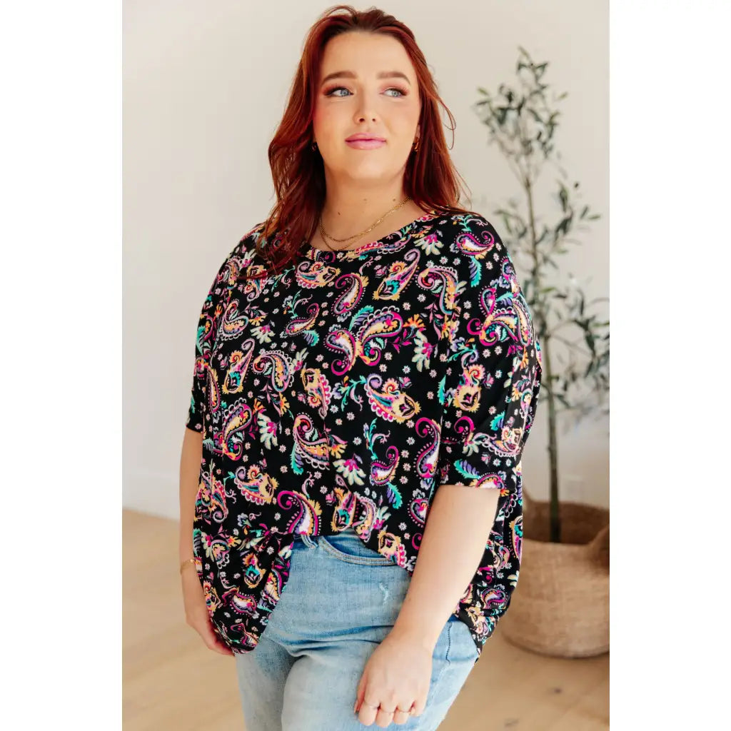 The Essential Blouse in Black and Pink Paisley is the perfect blend of style comfort. boat neck bat wing sleeve add