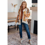 Our Exquisitely Fall Floral Cardigan is a retro mod floral oversized grandpa cardigan featuring an eye-catching large