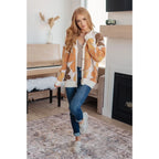 Our Exquisitely Fall Floral Cardigan is a retro mod floral oversized grandpa cardigan featuring an eye-catching large