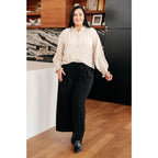 Chic cream button up top with ruffled neckline and relaxed fit. Plus size friendly perfect for layering tucking work