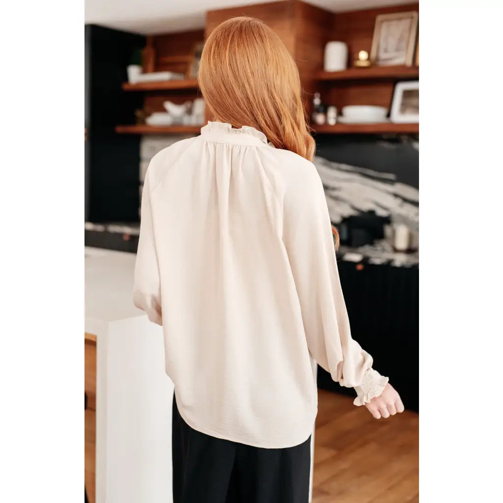 Chic cream button up top with ruffled neckline and relaxed fit. Plus size friendly perfect for layering tucking work