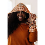 Our Fall Floral Mixed Print Hoodie features a rust colored brushed knit with patterned bulgari accents design.