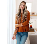 Our Fall Floral Mixed Print Hoodie features a rust colored brushed knit with patterned bulgari accents design.