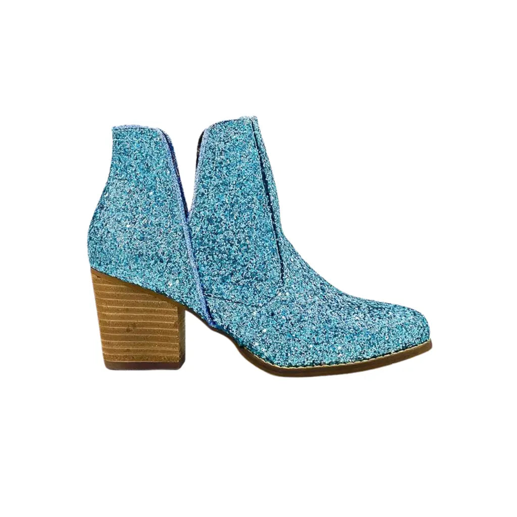 How cute are our Fiera Booties in Turquoise Blue Glitter? NOTHING quite says ’I’m here for the party’ like a pair