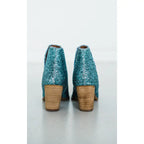How cute are our Fiera Booties in Turquoise Blue Glitter? NOTHING quite says ’I’m here for the party’ like a pair