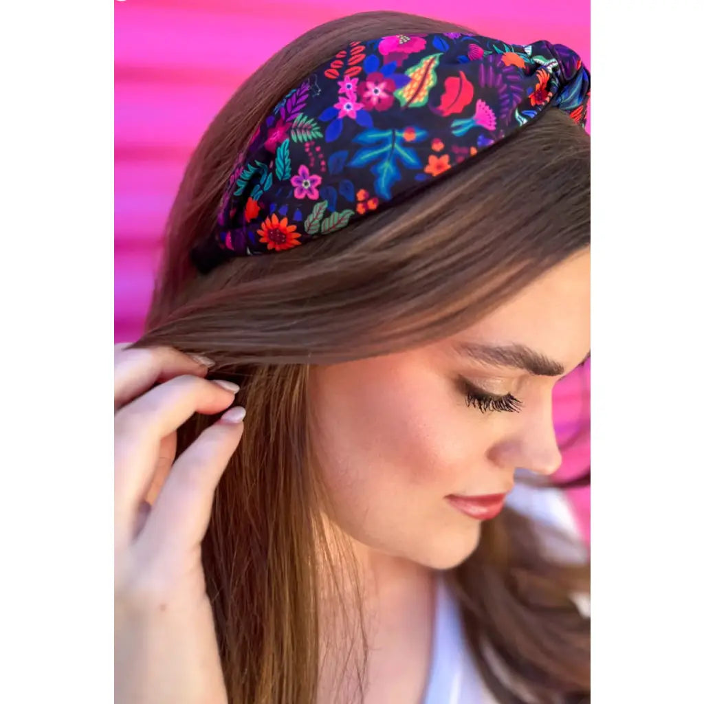 Top off your look in the most perfect of ways with our fun and festive Fiesta Time Floral Knot Headband!