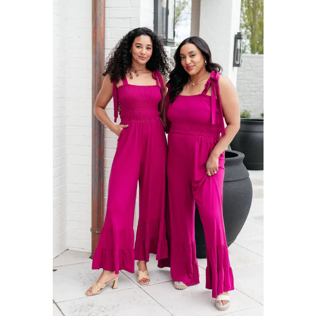 Our Flared and Ruffled Magenta Jumpsuit is perfect for every occasion. Crafted from thick stretchy jersey knit