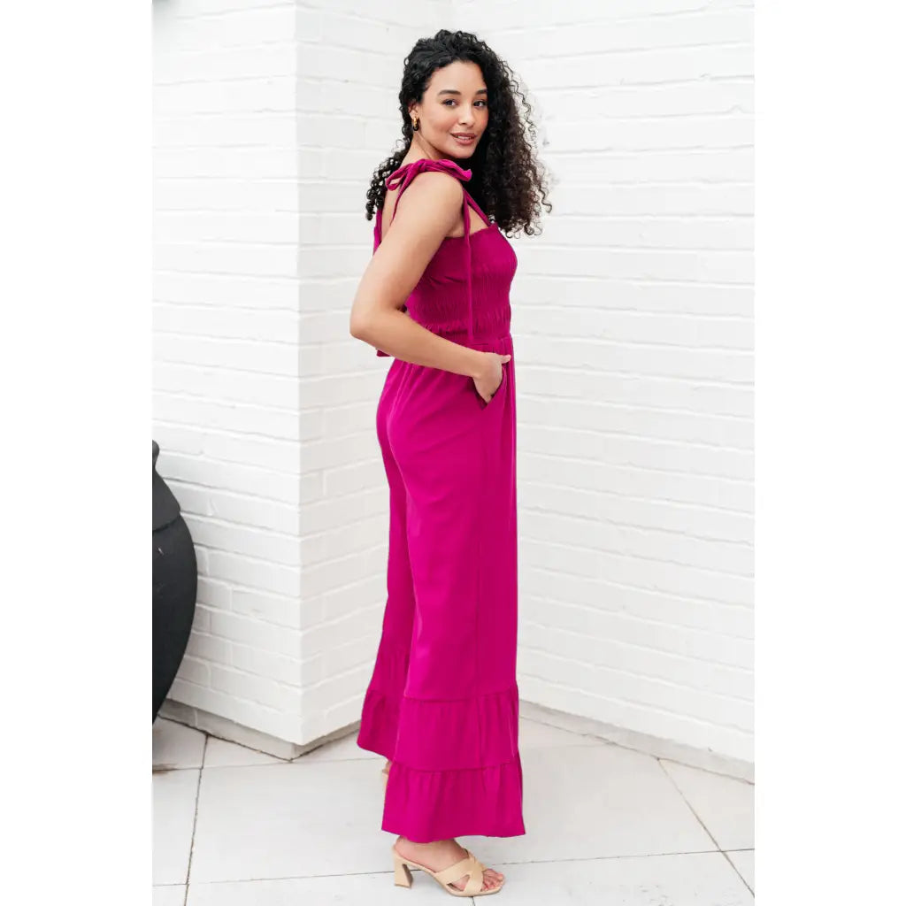 Our Flared and Ruffled Magenta Jumpsuit is perfect for every occasion. Crafted from thick stretchy jersey knit
