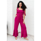 Our Flared and Ruffled Magenta Jumpsuit is perfect for every occasion. Crafted from thick stretchy jersey knit