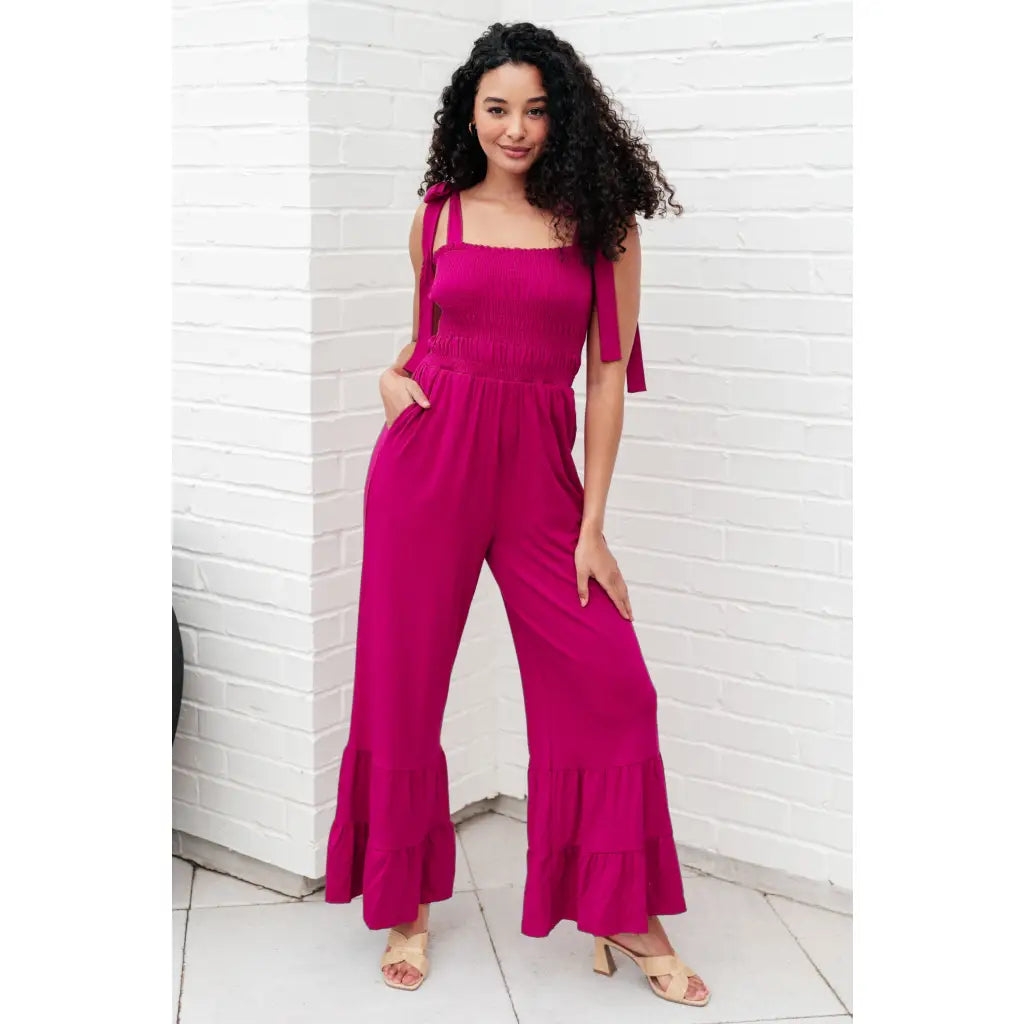 Our Flared and Ruffled Magenta Jumpsuit is perfect for every occasion. Crafted from thick stretchy jersey knit