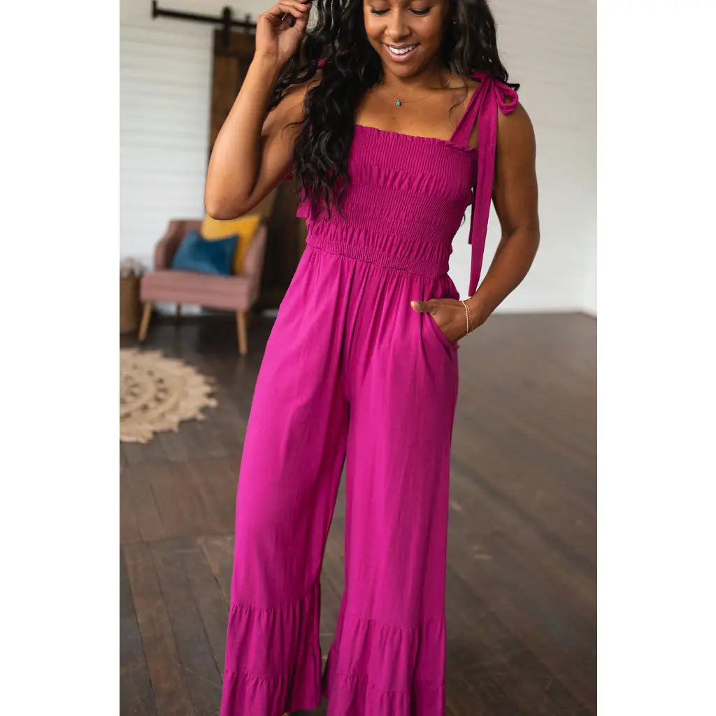 Our Flared and Ruffled Magenta Jumpsuit is perfect for every occasion. Crafted from thick stretchy jersey knit