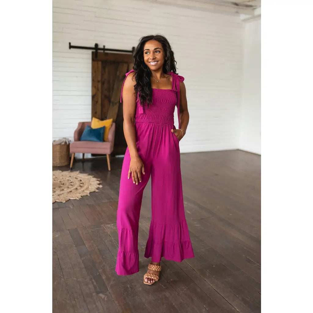 Our Flared and Ruffled Magenta Jumpsuit is perfect for every occasion. Crafted from thick stretchy jersey knit