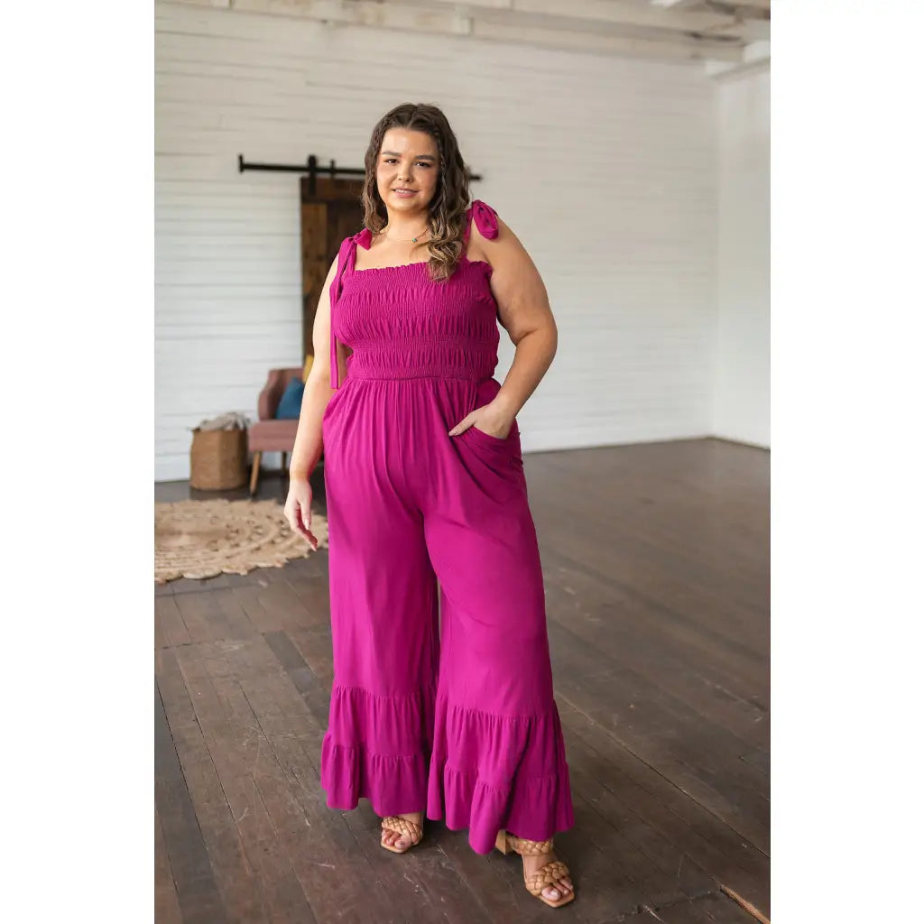 Our Flared and Ruffled Magenta Jumpsuit is perfect for every occasion. Crafted from thick stretchy jersey knit