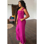 Our Flared and Ruffled Magenta Jumpsuit is perfect for every occasion. Crafted from thick stretchy jersey knit