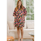 Our Floral Puff Sleeve Mini Dress exudes a feminine vibe with its delicate floral pattern on black background