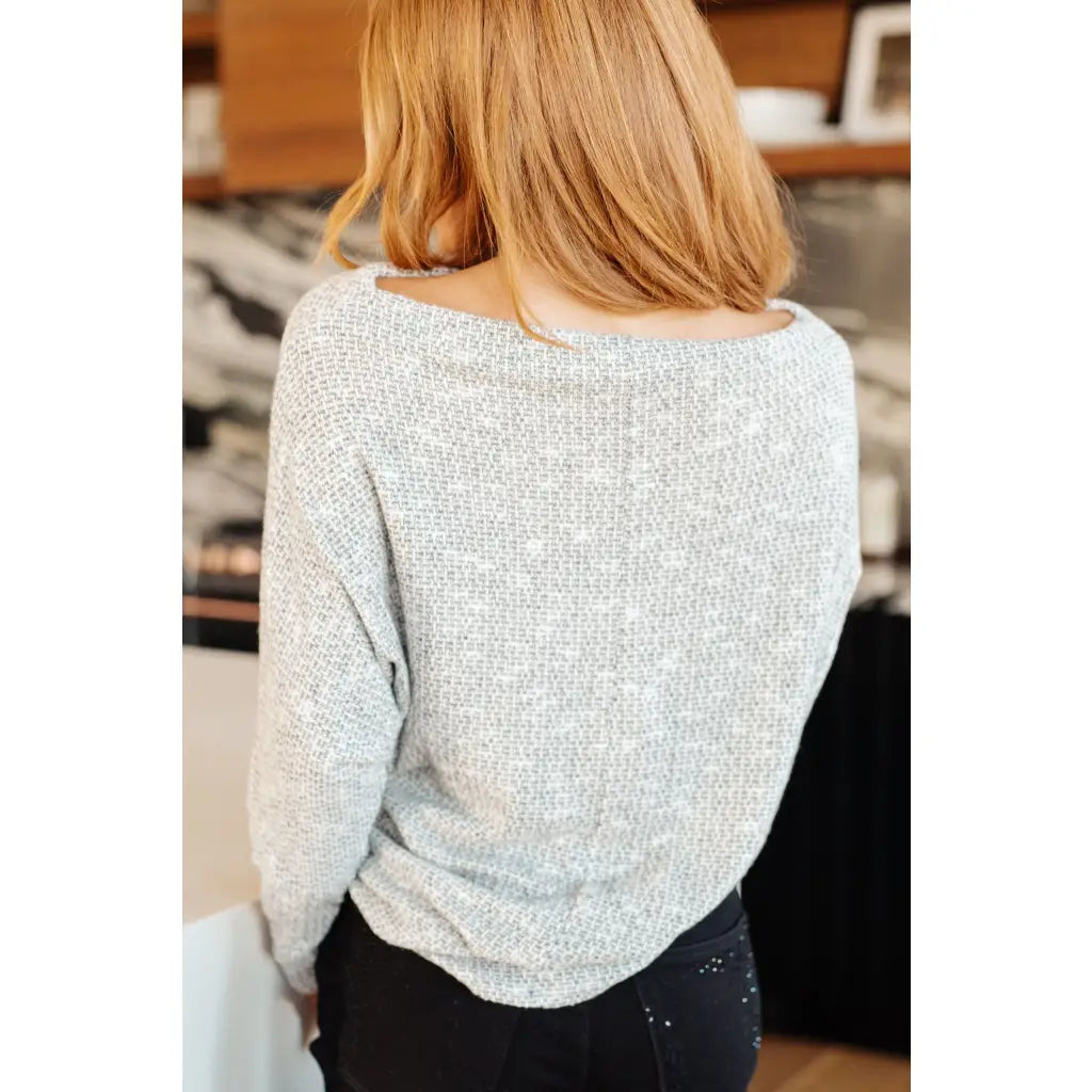 Introducing our Foggy Idea Boatneck Top! Made with light grey lightweight knit this top offers both cozy comfort