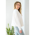 Those chilly days aren’t going anywhere anytime soon so make sure to stay cozy in our Fuzzy Cuddles Off White Sweater!