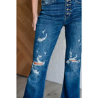 Our Gabriella Distressed Button Fly Flare Jeans by Judy Blue feature a stretch denim that shapes mid-rise and slight