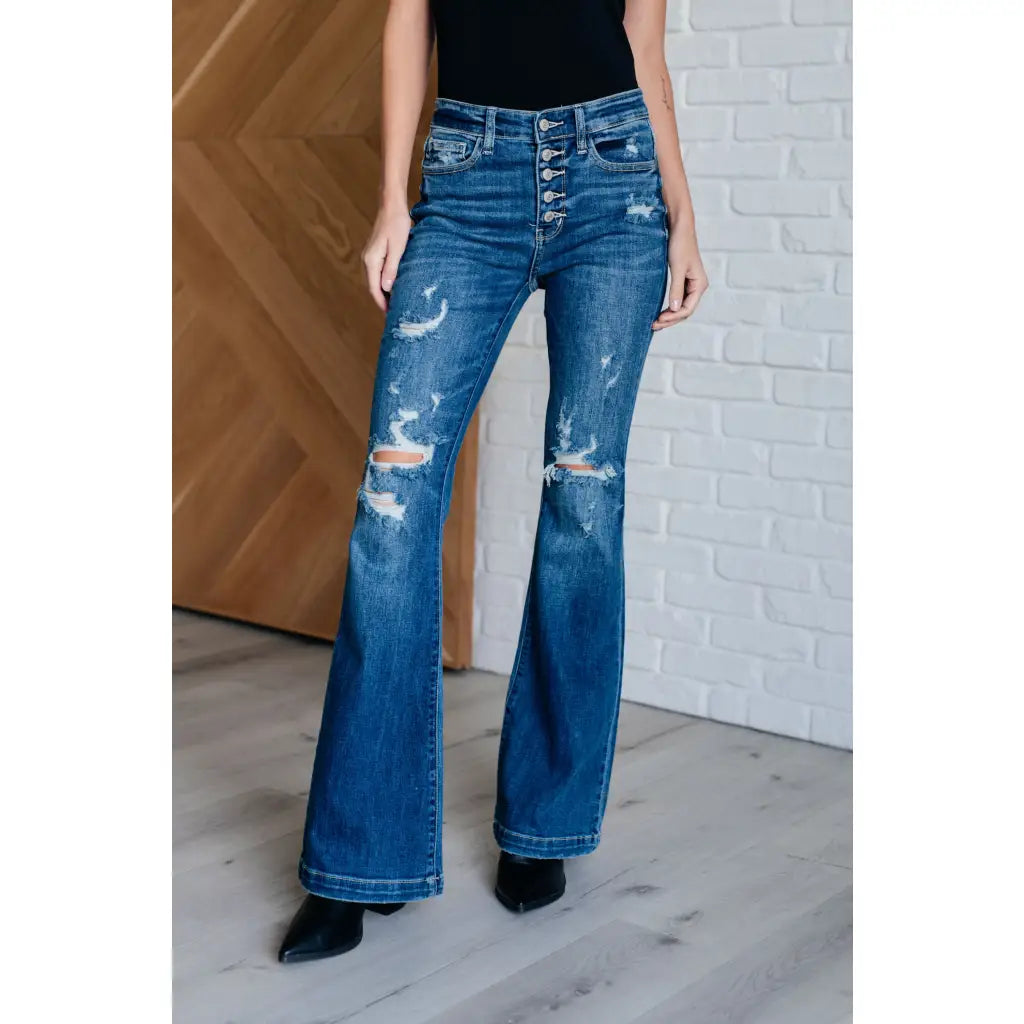 Our Gabriella Distressed Button Fly Flare Jeans by Judy Blue feature a stretch denim that shapes mid-rise and slight
