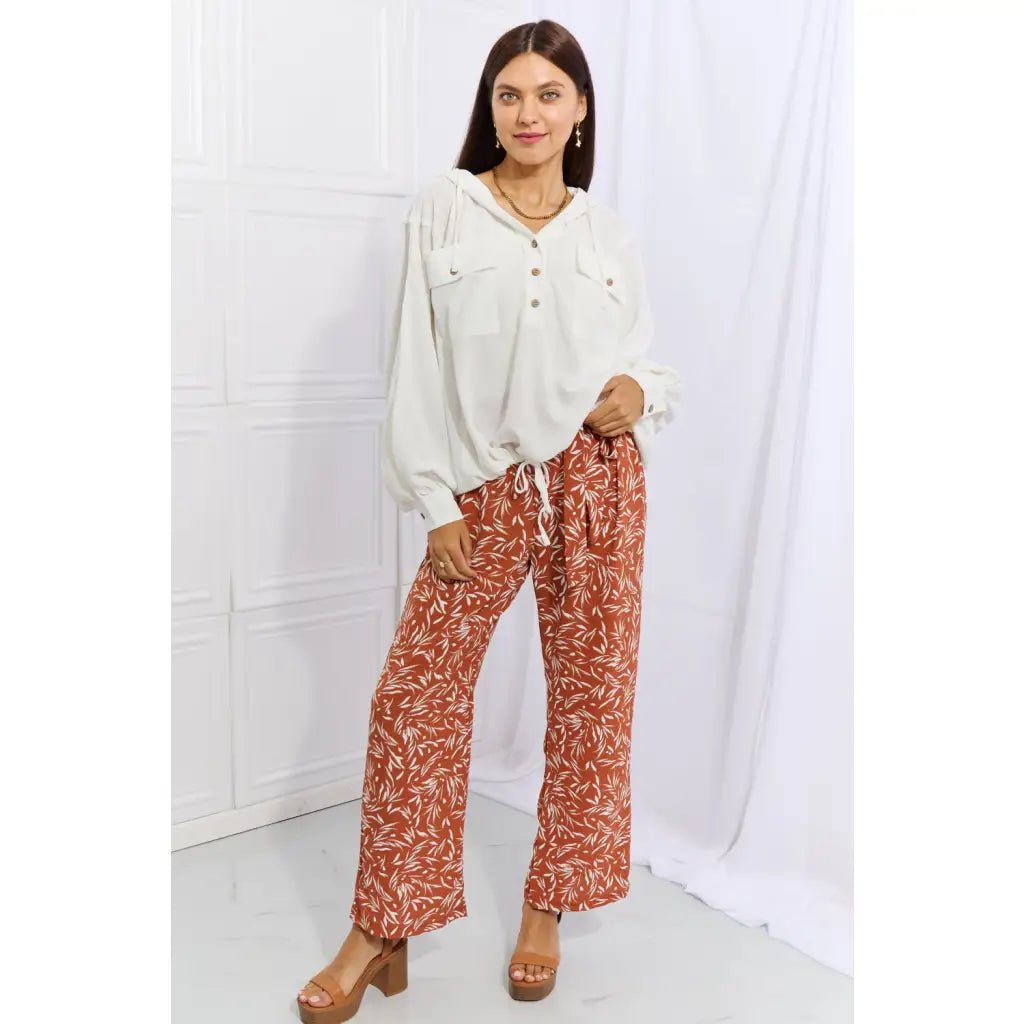 These trendy geometric print paperbag pants are made from a beautifully soft high-quality fabric. The elastic waistband