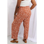 These trendy geometric print paperbag pants are made from a beautifully soft high-quality fabric. The elastic waistband