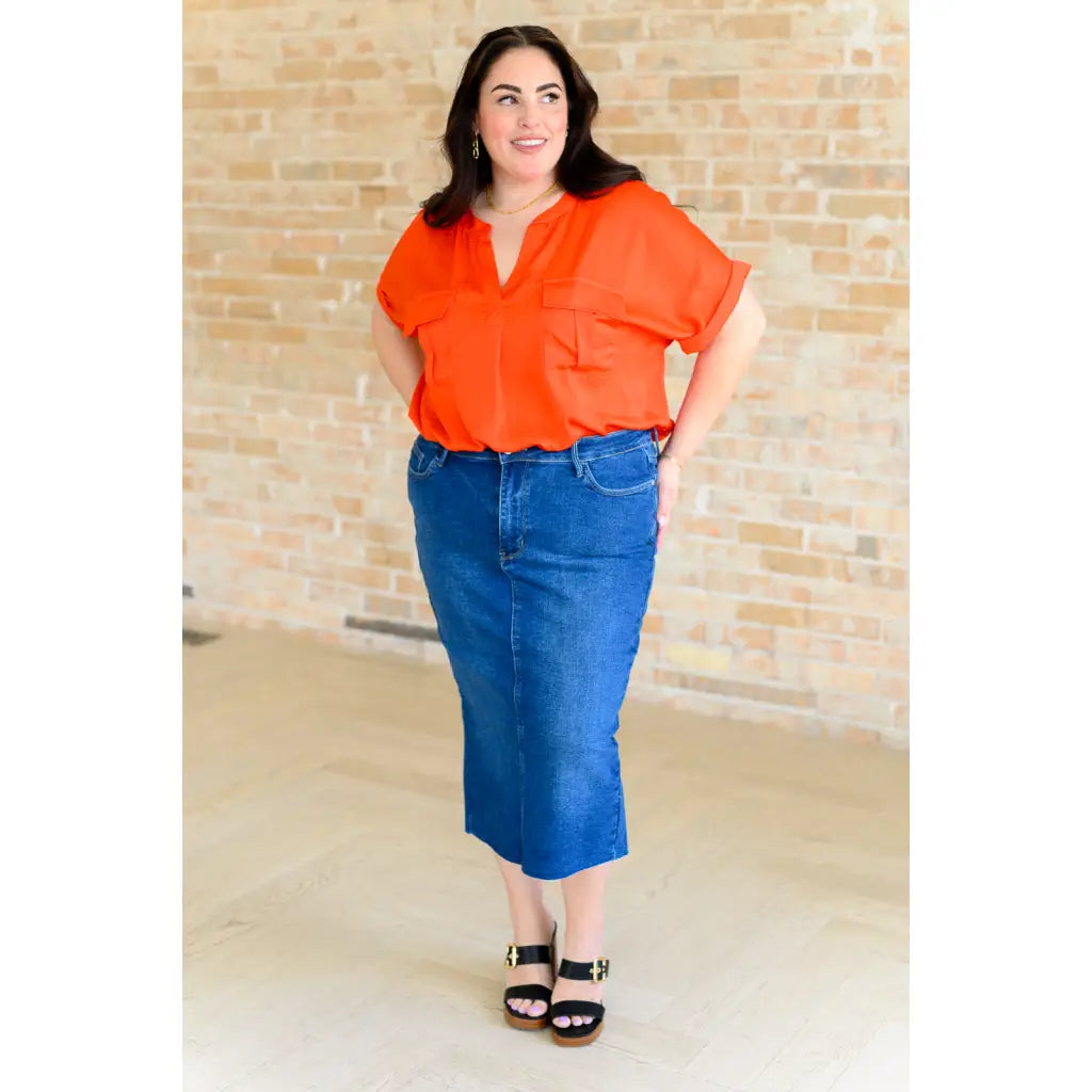 Bold and fun blouse in tomato red with flap pockets cuffed sleeves. A lightweight go-to for regular curvy or plus