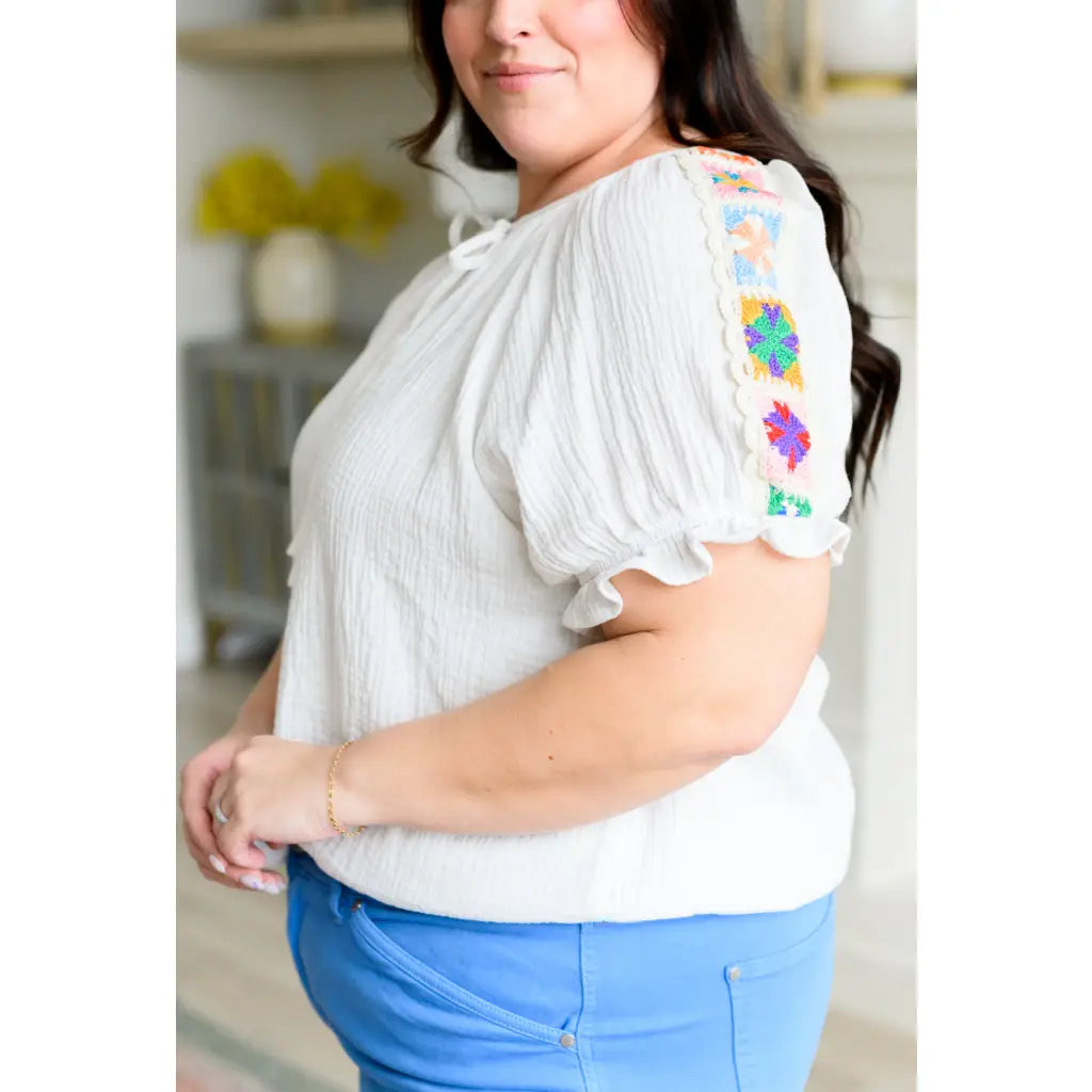 Elevate your boho - chic style with our Granny Squares Crinkle Knit Blouse. Crafted from lightweight white cotton gauze