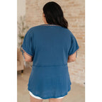 Get ready to strike a stylish pose with our Greece Lightning V-Neck Blouse! Made from comfortable jersey knit